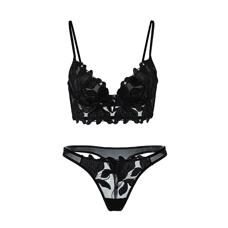 Black floral embroidery longline lingerie set by Maria Grazia Severi, product flat lay showing delicate design